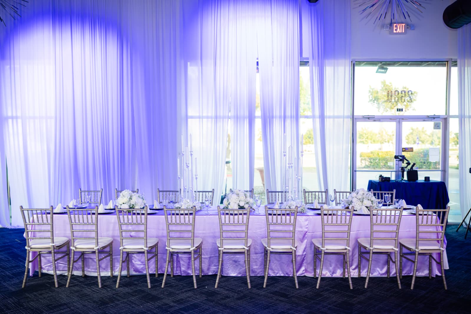 Lavender sheer drapery along the entry hallway at Silverstar Event Center in Lewisville, TX